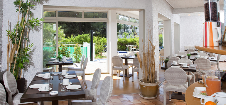 Photo de la salle du petit déjeuner de l'hôtel Europe