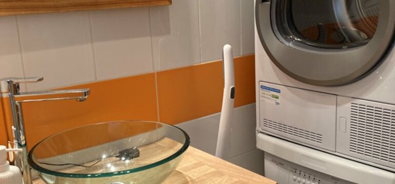 Salle de bain coin buanderie